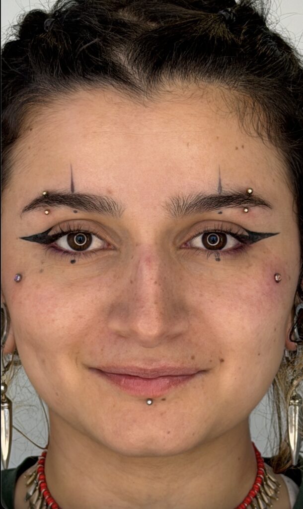 Microdermal piercing Camilo Barreto