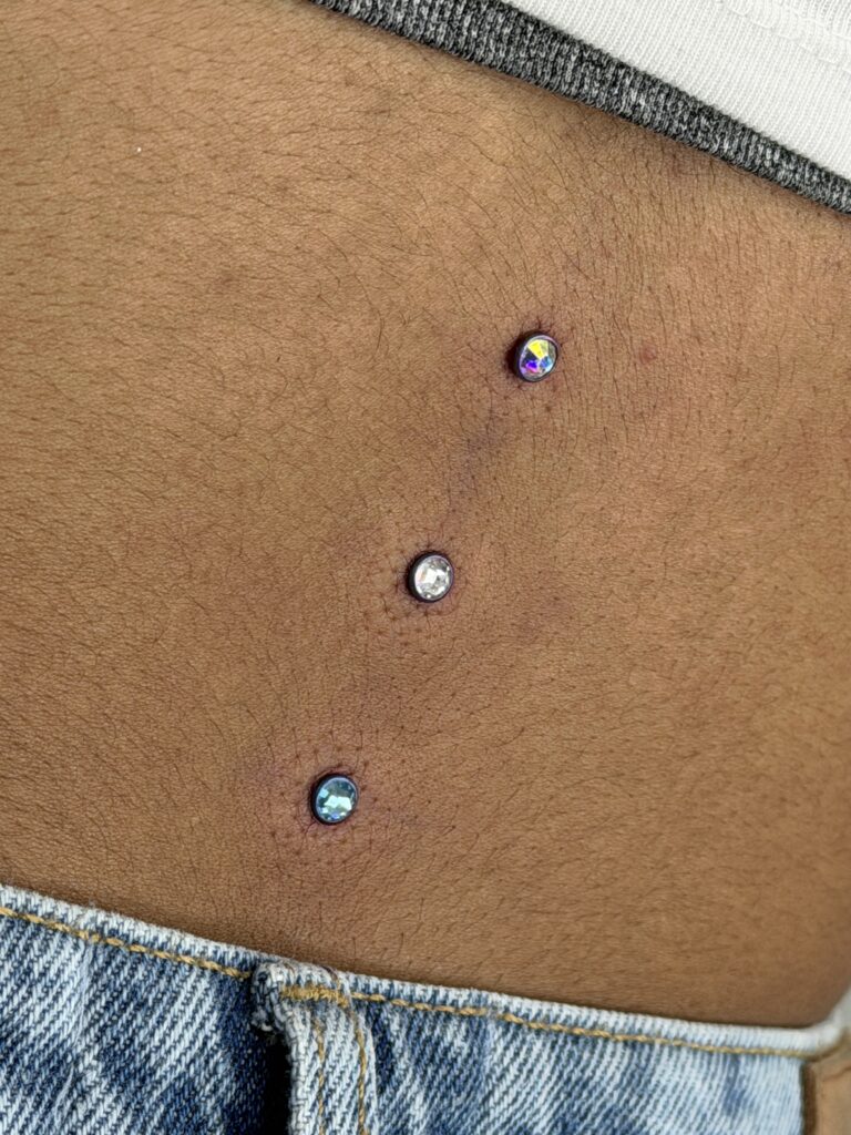 Microdermal piercing Camilo Barreto